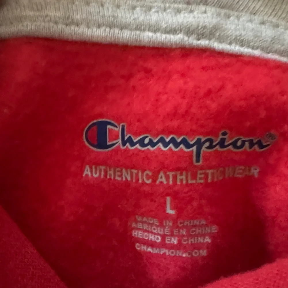 Bundle of TwoChampion Red Hooded Kids Sweatshirt with Cream & Navy Sherpa Jacket